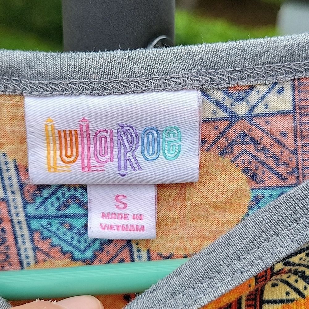 Lularoe
Disney shirt   - Picture 3 of 6